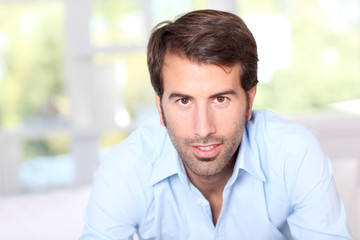 Portrait of handsome man with blue shirt © goodluz