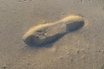 Fußabdruck im Sand