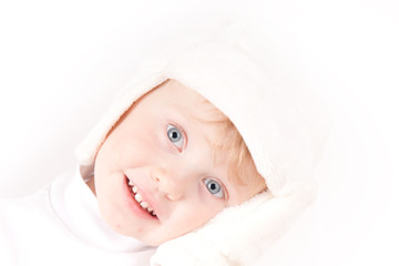 little girl in white winter hat