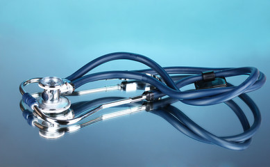 stethoscope on blue background