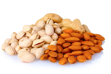 almonds and pistachios isolated on white