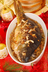 carp baked with almonds on sauerkraut for christmas