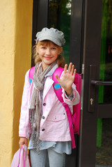 schoolgirl in the front of school