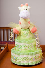 Green and yellow gender neutral diaper cake