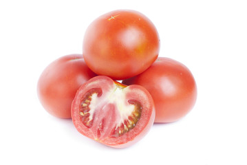 fresh red tomatoes isolated on white background