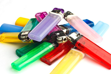 Pile of lighters in a variety of colors
