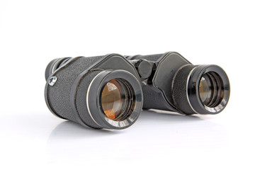 old binoculars on white background