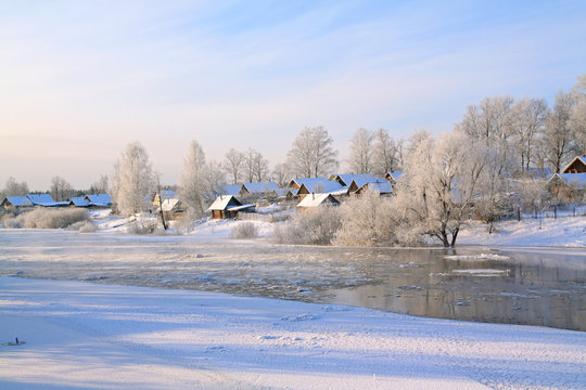winter village on coast river
