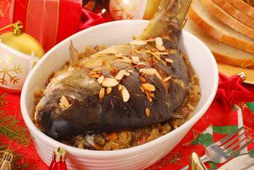 carp baked with almonds on sauerkraut for christmas