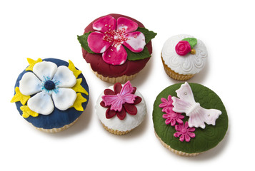 Fototapeta na wymiar Five cupcakes