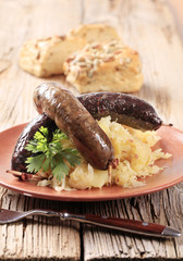 Blood sausage and white pudding with sauerkraut