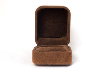 Opened brown velvet ring box for jewelry