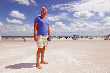 Handsome middle age man enjoying Miami South Beach
