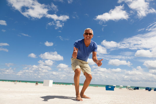 Handsome middle age man enjoying Miami South Beach