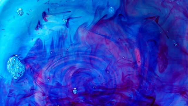 Blue Ink flowing in water