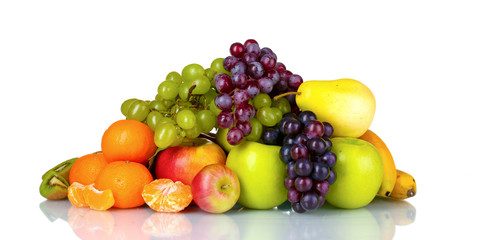 Ripe juicy fruits isolated on white