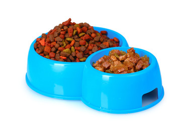 Dry cat food in bowls isolated on white