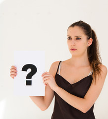portrait young woman with board question mark sign