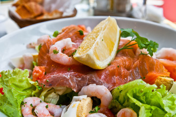 Fresh seafood salad with smoked salmon