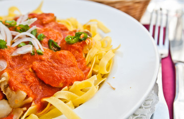 Italian meat sauce noodles on the table