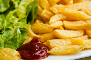 Golden French fries potatoes ready to be eaten