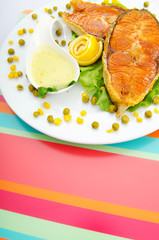 Roasted salmon in the plate