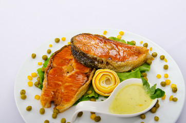Roasted salmon in the plate