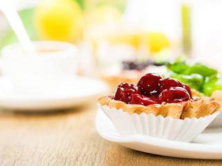 Fruit dessert and coffee