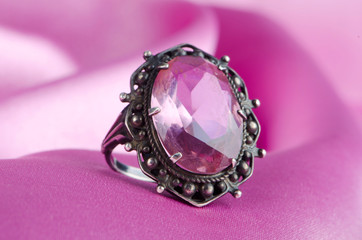 Fashion concept with ring on background