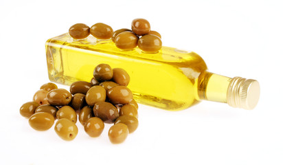 Olives and olive oil in square bottle