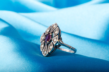 Fashion concept with ring on background