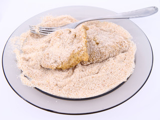 Soy Meat being prepared in breadcrumbs