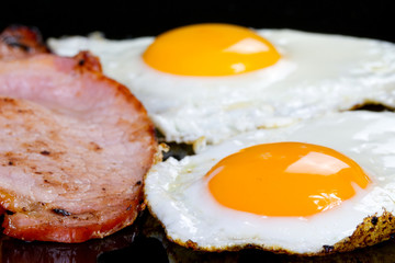 Irish breakfast with two eggs, bacon and toast