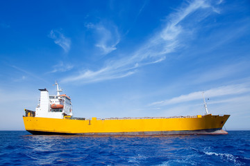Anchor cargo yellow boat in blue sea