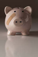 Piggy Bank with Bandage on Face