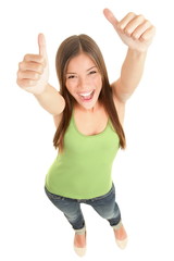 Happy woman giving thumbs up - 35893052