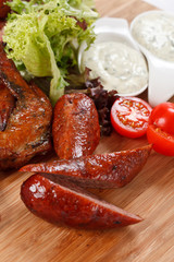 sausages on a wooden cutting board
