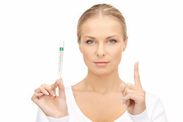 attractive female doctor with thermometer