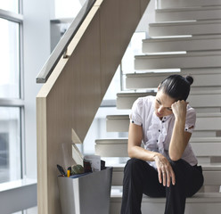 Downsizing, sad business woman Sitting on Stairs - 35896697