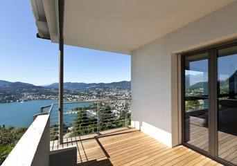 Fototapeta premium Modern apartment, balcony overlooking the lake