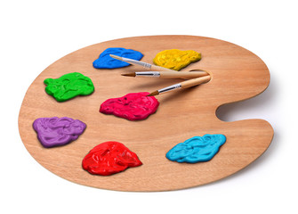 Artist palette with colors and brushes