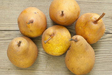 pears on wooden table