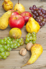 apples grapes and pears, wooden table
