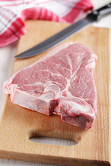 Raw T-bone steak