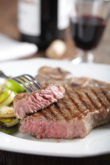 Medium rare steak on the plate