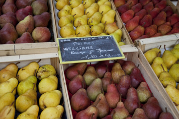 Selection of pears for sale on market stall