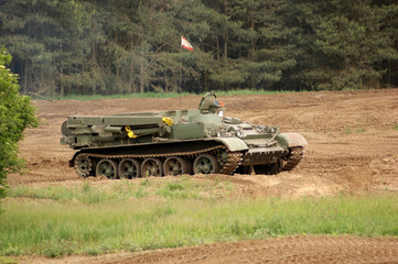 Fototapeta premium offroad scenery with driving tank