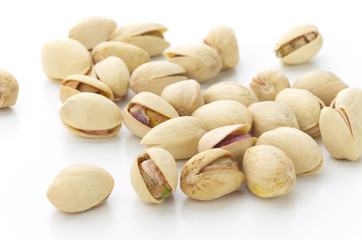 Pistachios on white