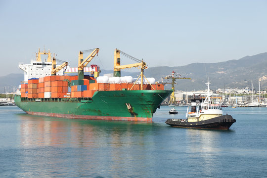 tug and container ship