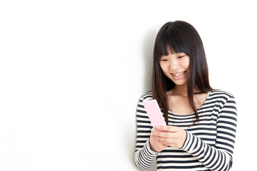 pretty asian woman using cellphone